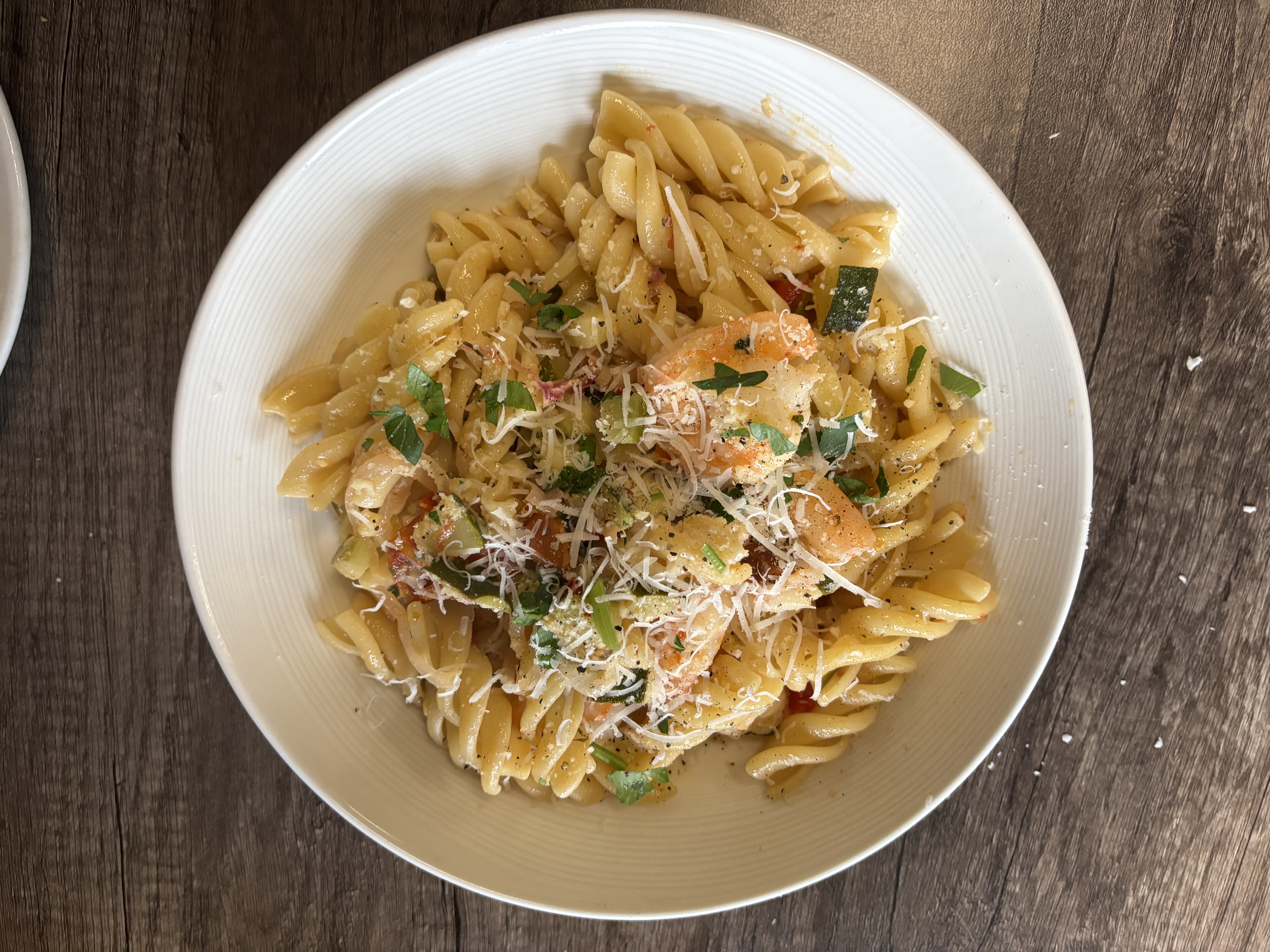 Shrimp and pesto with parmesan cheese and fusilli pasta