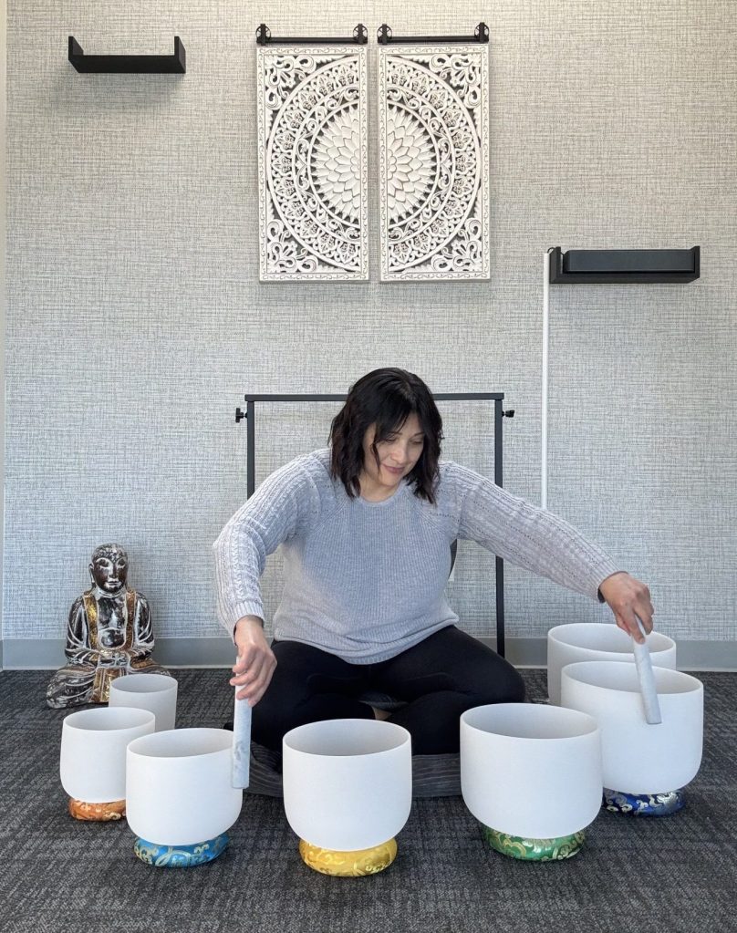 Mirtha Lopez, a spiritual healing practitioner, demonstrating a south bath.